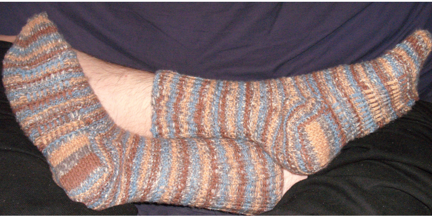 Mistake-Stitch Ribbing Sock Pattern with Embedded Moss Stitch and Heel Stitch Toe pattern preview