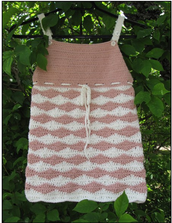 Crochet Pattern for Baby Jumper with Adjustable Shoulder Straps and Decorative Bow pattern preview