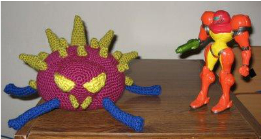 Amigurumi Pattern for a Cute Fuschia-Colored Creature with Triangular Head pattern preview