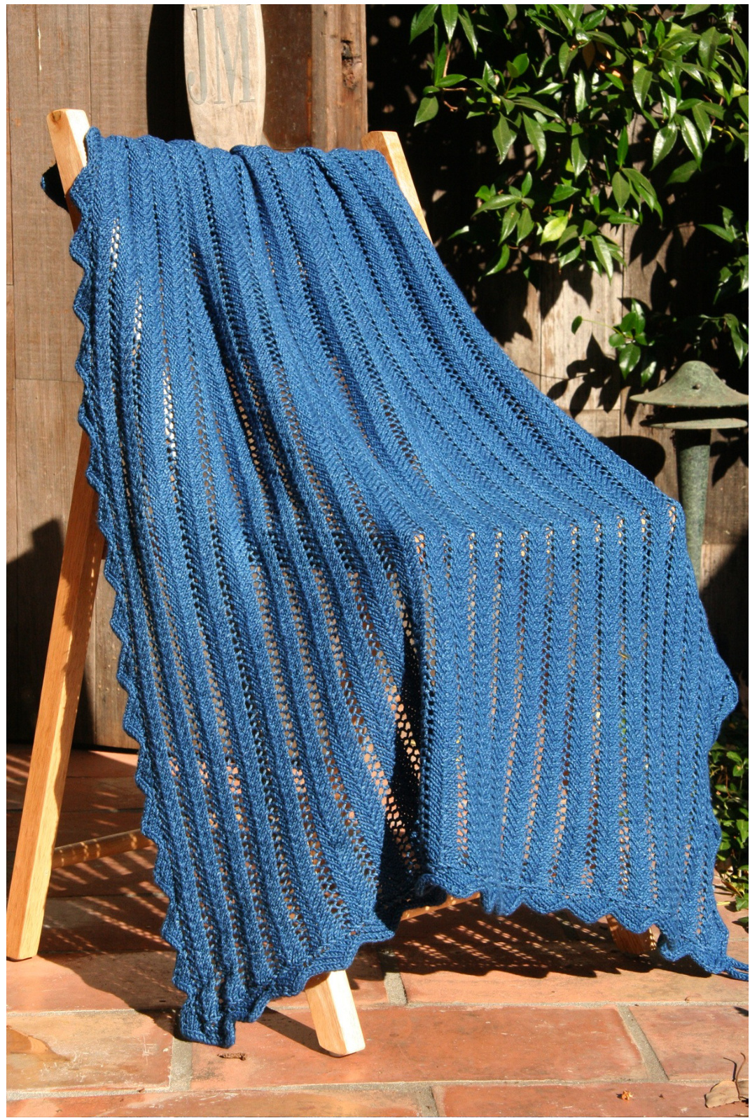 Cielo Baby Blanket Pattern: Intermediate Knitting Design in Indigo Cotton with Chevron Lace and I-Cord Edging pattern preview