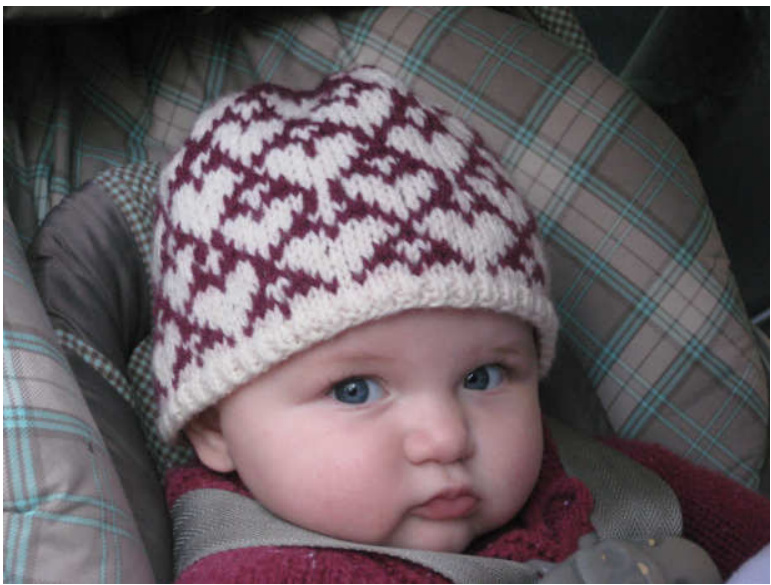 Cadence Baby Hat Pattern by Shannon M.Simonelli - Knitting Design for 6 Month Old Babies with Fair Isle Triangular Motif Turning into Hearts pattern preview