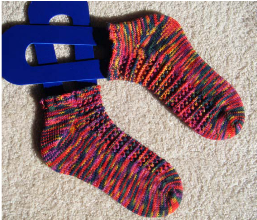 Cozy Gusset Heel Slipper Knitting Pattern for Warmth and Comfort, Featuring Various Yarn Suggestions and Custom Sizing Options pattern preview