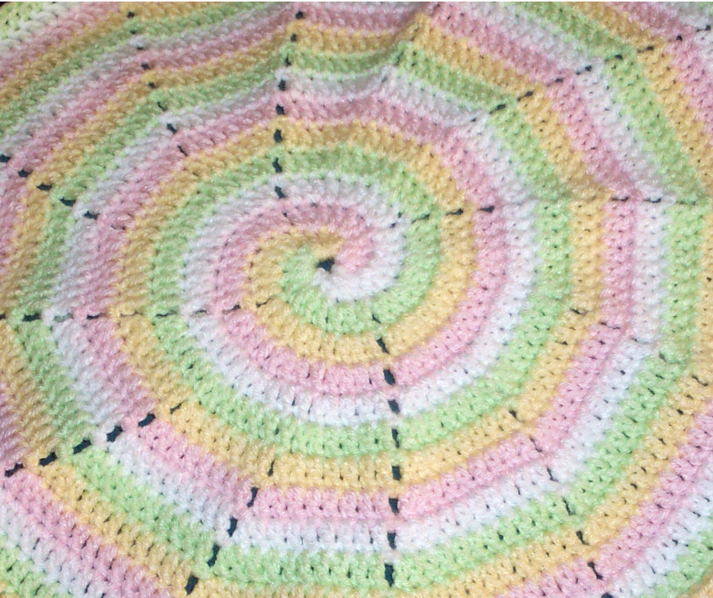 SmoothFox's Four Color Spiral Blanket Crochet Pattern: A Multi-Colored, Spiral Design for Newborns by Donna Mason-Svara pattern preview