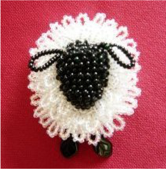 Knitted Sheep Pin Pattern with Beaded Embellishments and Assembly Instructions for Fiber Craft Enthusiasts pattern preview