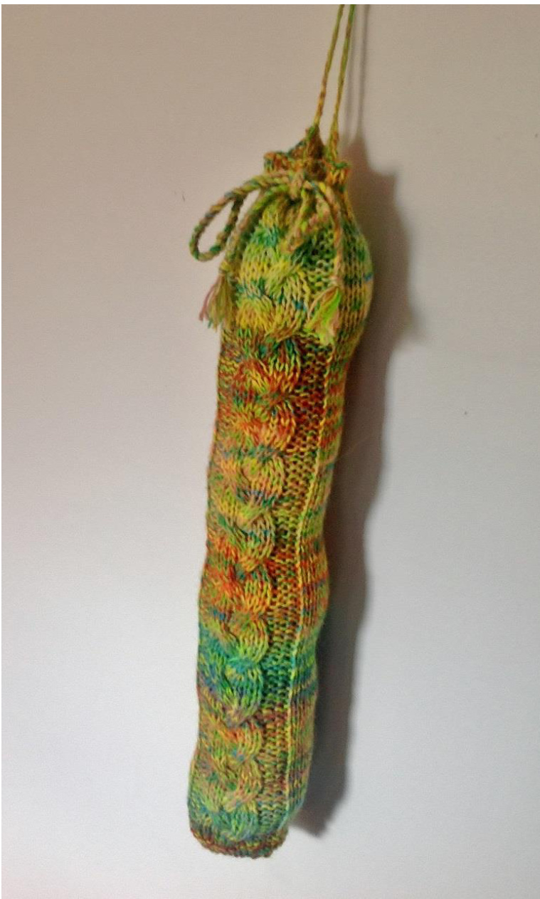 Crochet Storage Tube for Grocery Bags with Braided Cable Design - Detailed Knitting Instructions pattern preview