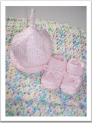 Comprehensive Guide to Knitting Newborn Roll Brim Hat with Topknot and Baby Booties pattern preview